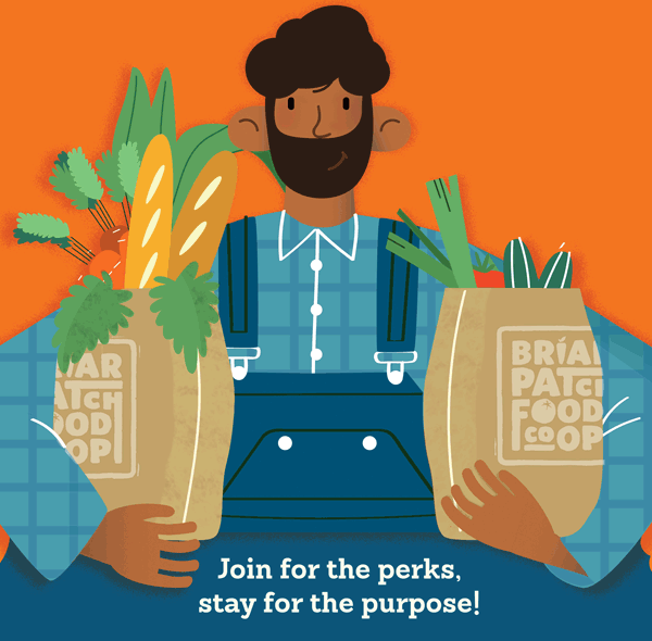 briarpatch shopper owner man with beard holding two brown paper bags filled with fresh groceries
